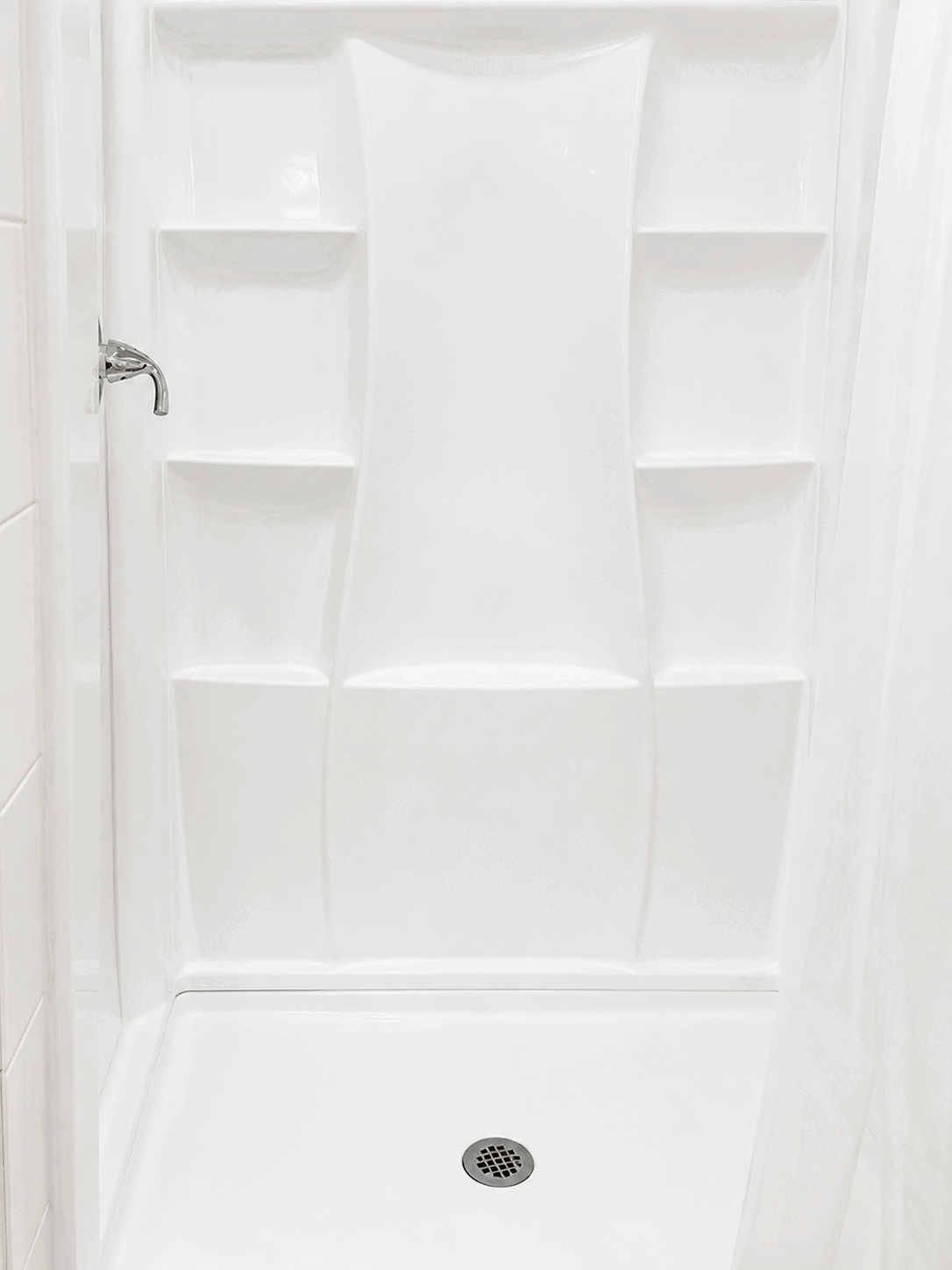 Bright empty shower after move-in cleaning